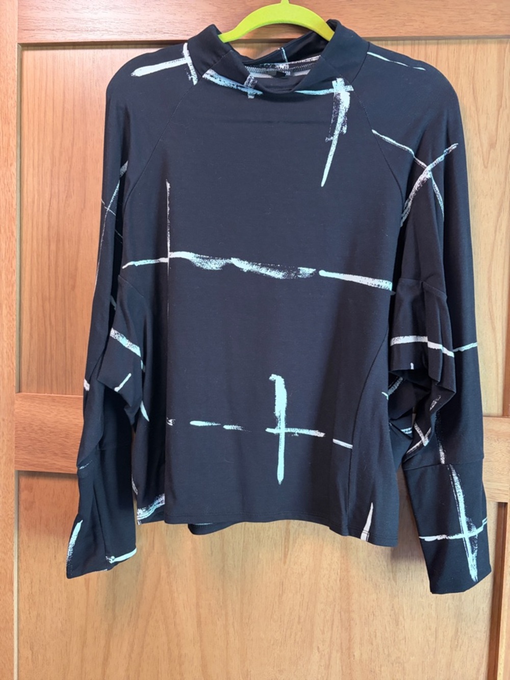 Black Mock Neck Long Sleeve Top with Light Blue Brushstroke Print